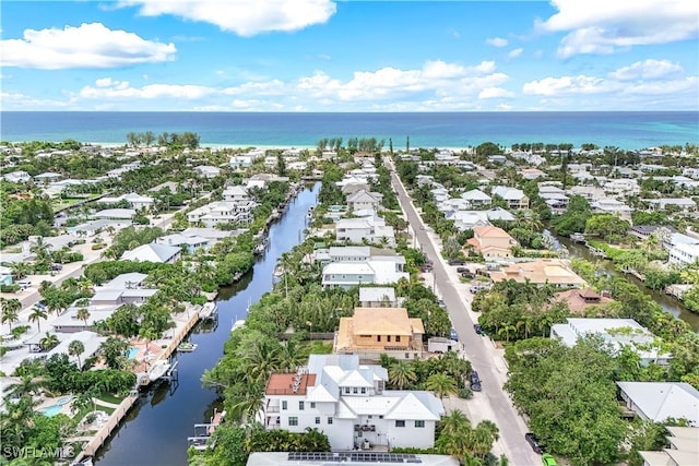 drone / aerial view with a water view