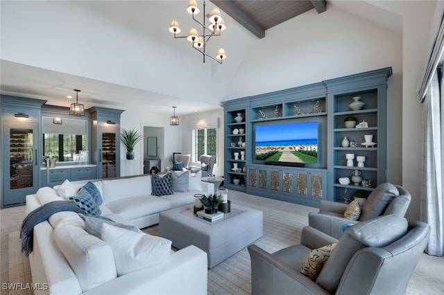 living room with beam ceiling and high vaulted ceiling