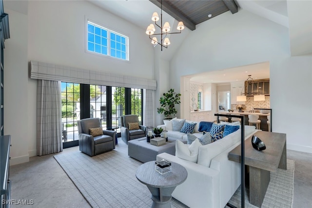 254 Audubon Blvd, Naples, FL 34110 - living room featuring beamed ceiling, baseboards, high vaulted ceiling, and a chandelier