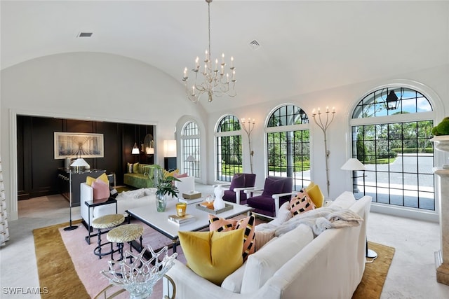 254 Audubon Blvd, Naples, FL 34110 - living room featuring visible vents, lofted ceiling, and a wealth of natural light