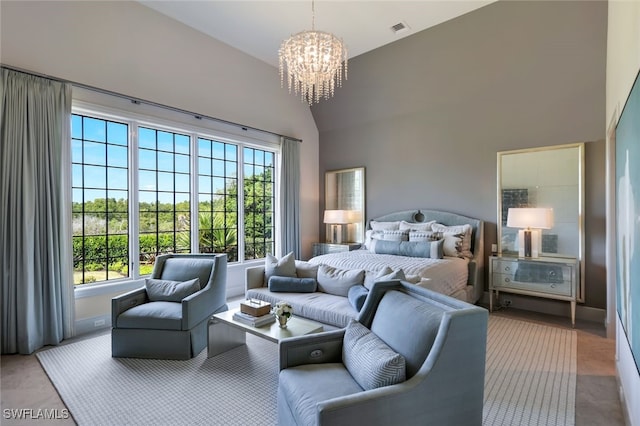 bedroom with a chandelier and lofted ceiling