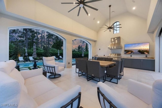 254 Audubon Blvd, Naples, FL 34110 - view of patio with an outdoor kitchen, ceiling fan, outdoor lounge area, an outdoor pool, and outdoor dining space