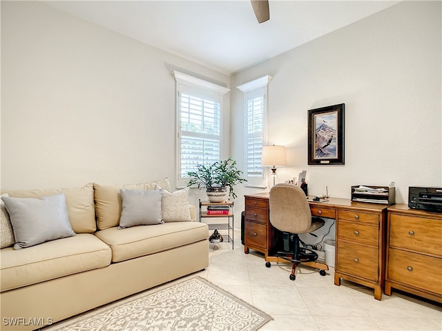 office with ceiling fan and light tile patterned floors