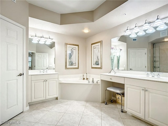 bathroom with tile patterned flooring, vanity, and plus walk in shower