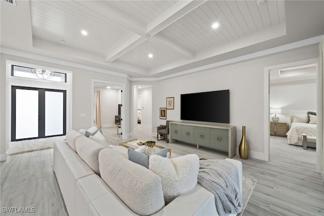 living room featuring french doors and light hardwood / wood-style flooring