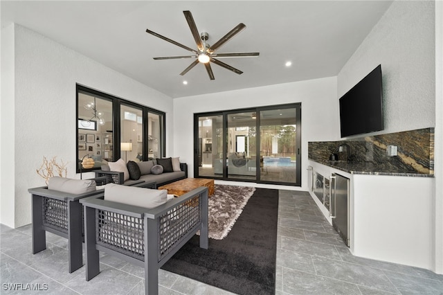 living room with ceiling fan