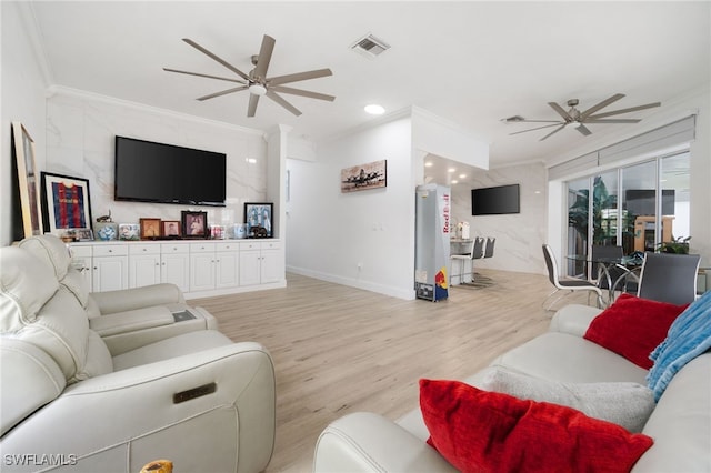 living room with ceiling fan, light hardwood / wood-style flooring, and ornamental molding