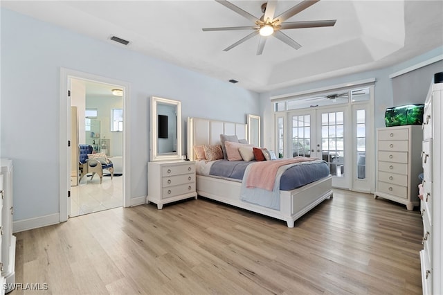 bedroom with access to outside, ceiling fan, french doors, and light hardwood / wood-style floors