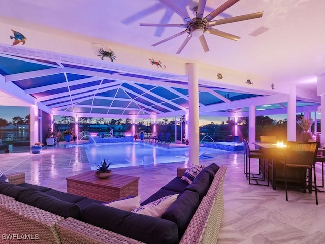 patio terrace at dusk featuring outdoor lounge area, pool water feature, and a swimming pool with hot tub