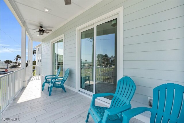 balcony featuring ceiling fan