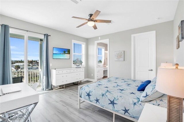 bedroom with ceiling fan, access to exterior, ensuite bathroom, and light hardwood / wood-style flooring