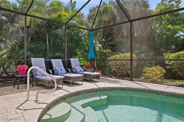 25040 Bay Cedar Dr, Bonita Springs, FL 34134 - view of pool featuring glass enclosure and a patio
