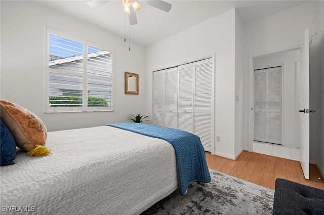 bedroom with wood-type flooring and ceiling fan