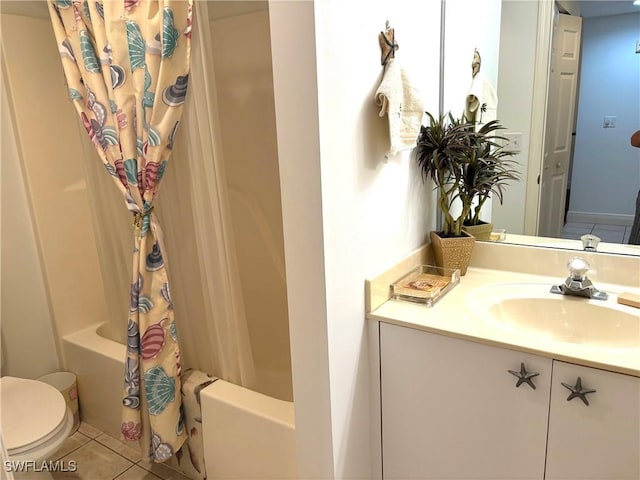 full bathroom featuring shower / tub combo, vanity, tile patterned floors, and toilet