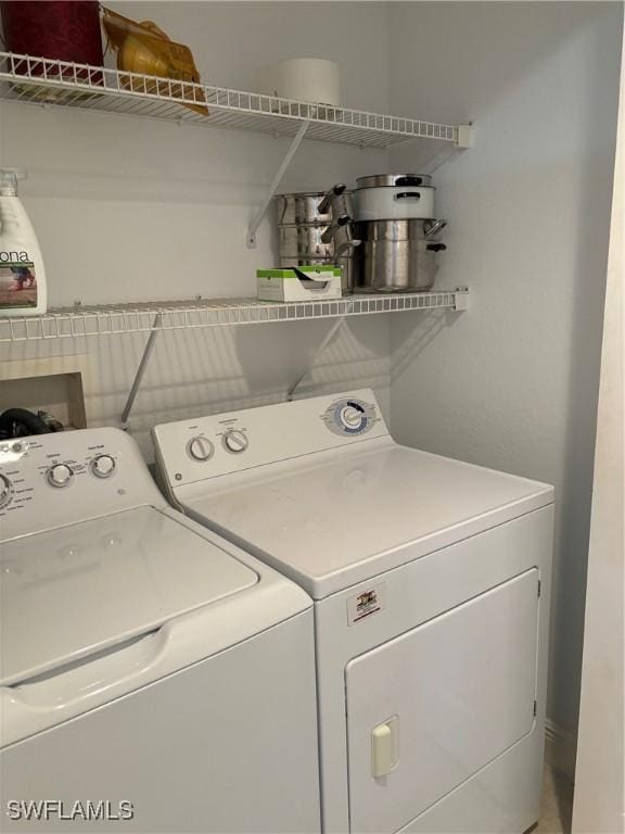 washroom featuring separate washer and dryer