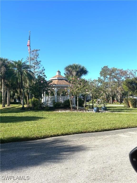 view of community featuring a gazebo and a lawn