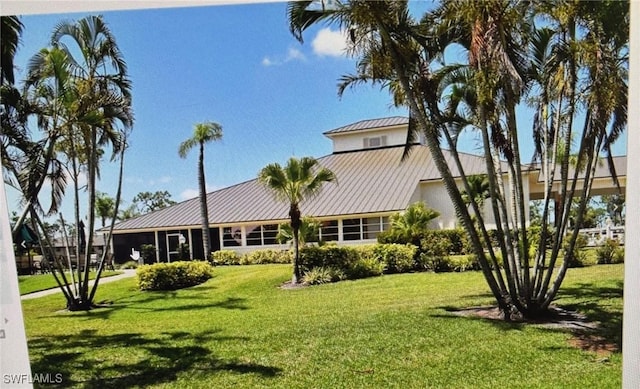 exterior space featuring a front lawn