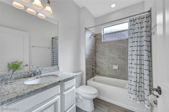 full bathroom with vanity, toilet, shower / tub combo with curtain, and hardwood / wood-style flooring