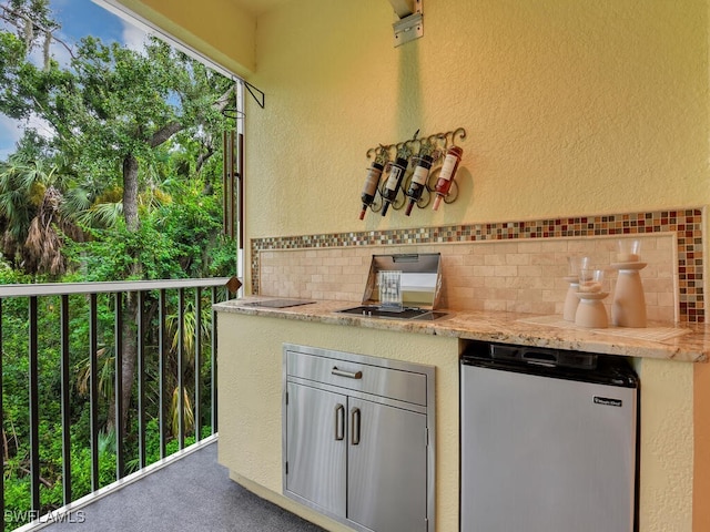 view of patio with a balcony