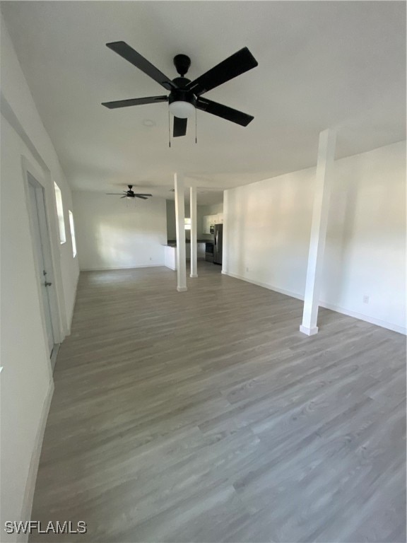 empty room with hardwood / wood-style floors