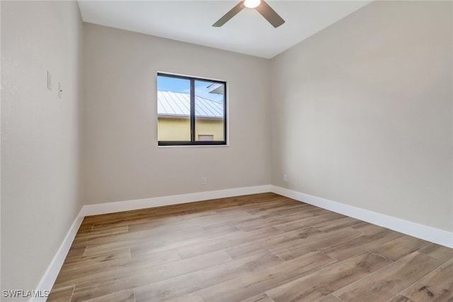 unfurnished room featuring light hardwood / wood-style floors and ceiling fan