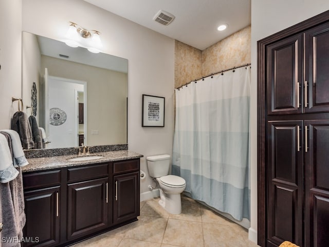 bathroom with tile patterned flooring, vanity, toilet, and a shower with curtain