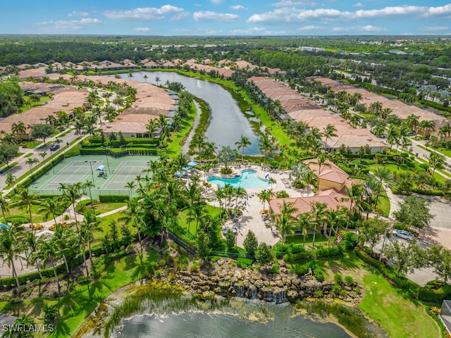 birds eye view of property featuring a water view