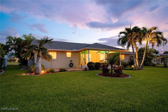 view of front of home featuring a yard