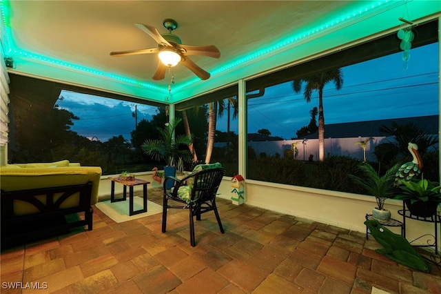 exterior space featuring ceiling fan and outdoor lounge area