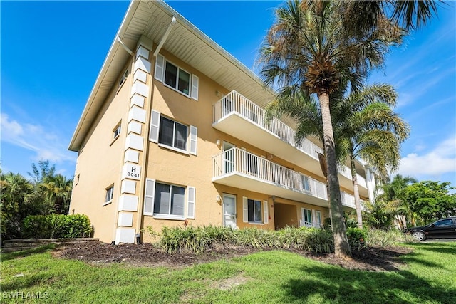 3041 Sandpiper Bay Cir Unit H201, Naples, FL 34112 - view of apartment building / complex
