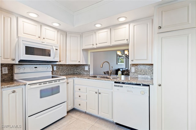 kitchen with white cabinetry, white appliances, and crown molding