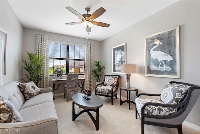 16564 Kingwood Ln Unit 35-201, Babcock Ranch, FL 33982 - living area with baseboards, ceiling fan, and light carpet