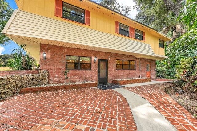 18191 Slater Rd, North Fort Myers, FL 33917 - view of front of house with brick siding