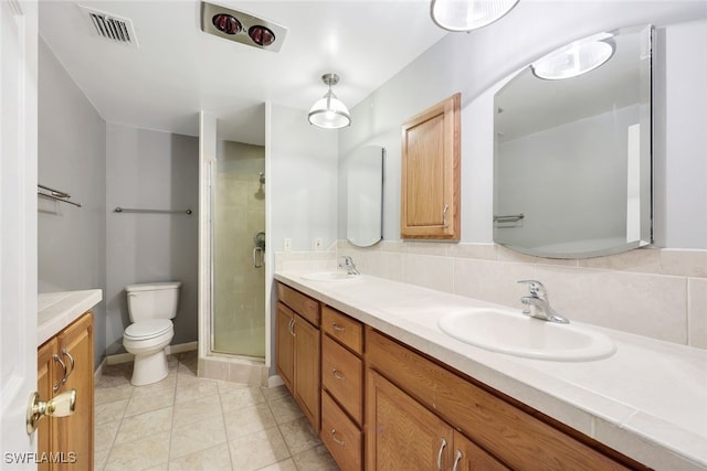 18191 Slater Rd, North Fort Myers, FL 33917 - full bathroom with visible vents, a sink, a shower stall, and toilet