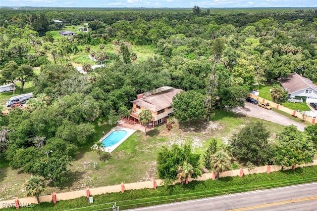 aerial view featuring a view of trees