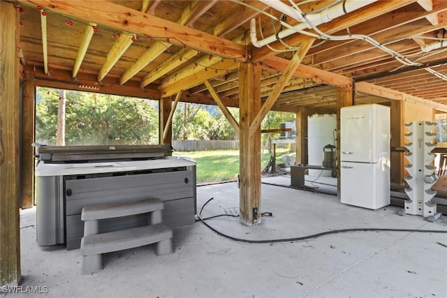 view of patio / terrace featuring a hot tub