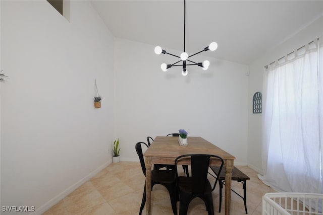 tiled dining area featuring lofted ceiling and a notable chandelier