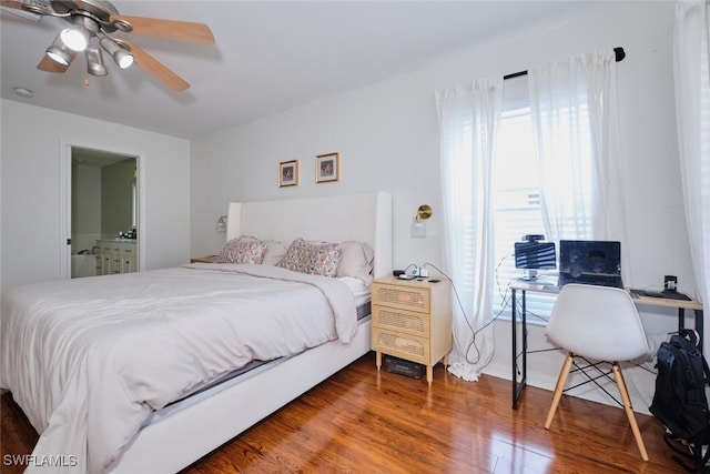 bedroom featuring wood-type flooring and ceiling fan