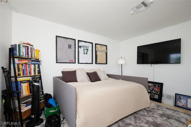 bedroom featuring carpet