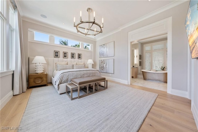 bedroom featuring light wood-type flooring, crown molding, baseboards, and an inviting chandelier