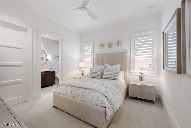 4220 Crayton Rd, Naples, FL 34103 - bedroom featuring multiple windows, light carpet, crown molding, ceiling fan, and connected bathroom