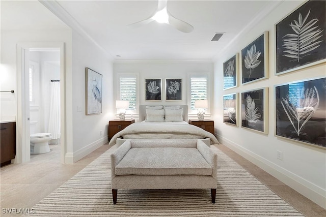 bedroom featuring baseboards, visible vents, a ceiling fan, ornamental molding, and ensuite bathroom