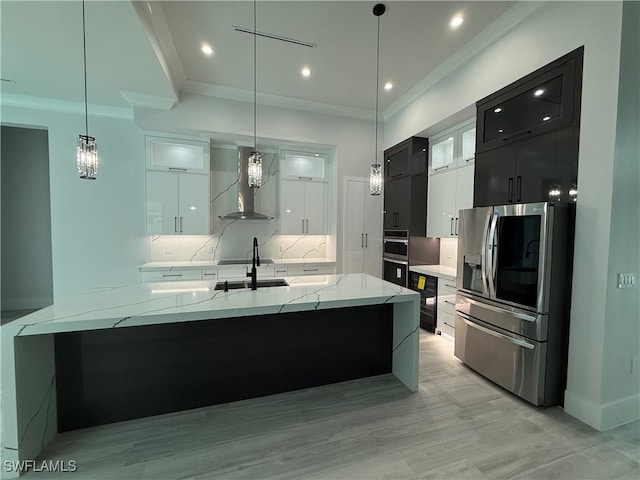 bathroom featuring wine cooler, backsplash, wood-type flooring, vanity, and ornamental molding