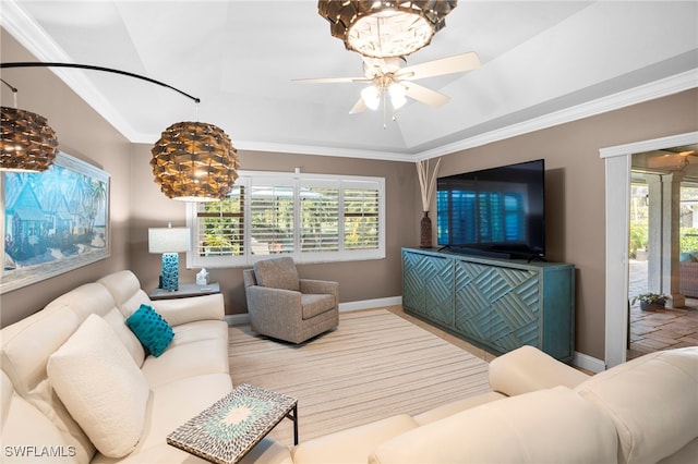 living room featuring ceiling fan with notable chandelier and ornamental molding