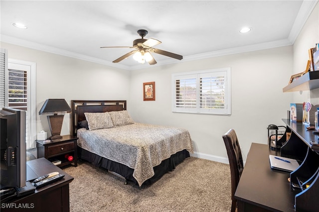 carpeted bedroom featuring ceiling fan and crown molding