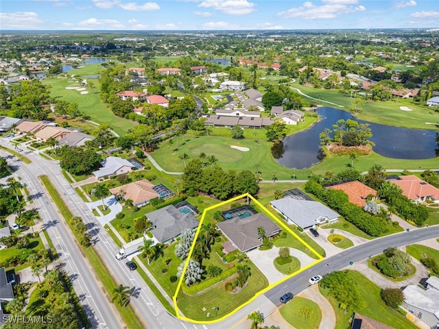 aerial view featuring a water view, a residential view, and golf course view