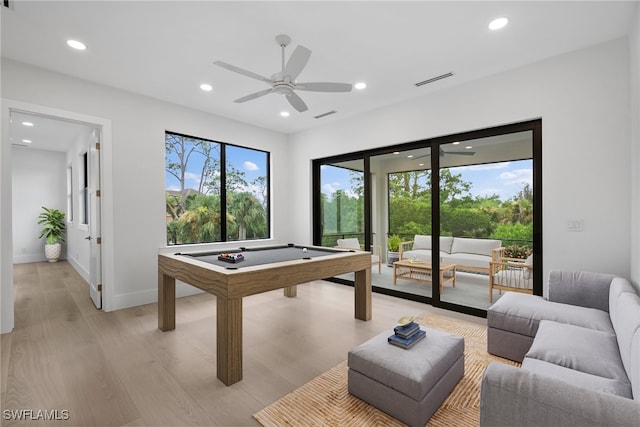 game room featuring billiards, ceiling fan, and light hardwood / wood-style floors