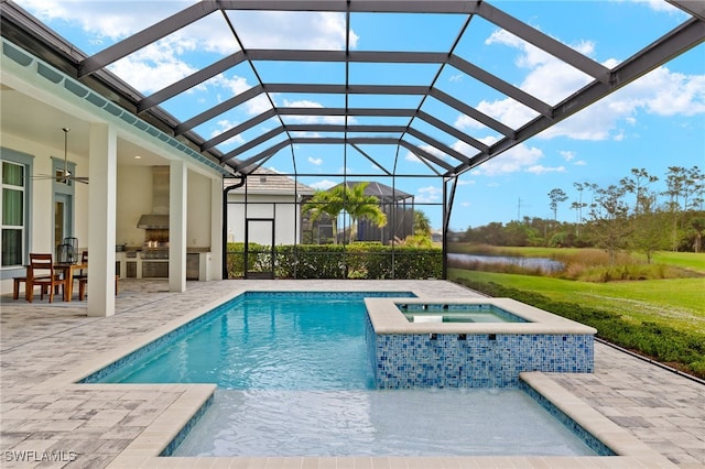 view of pool with glass enclosure, an in ground hot tub, a patio, area for grilling, and ceiling fan