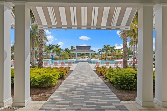 view of home's community featuring a swimming pool and a gazebo