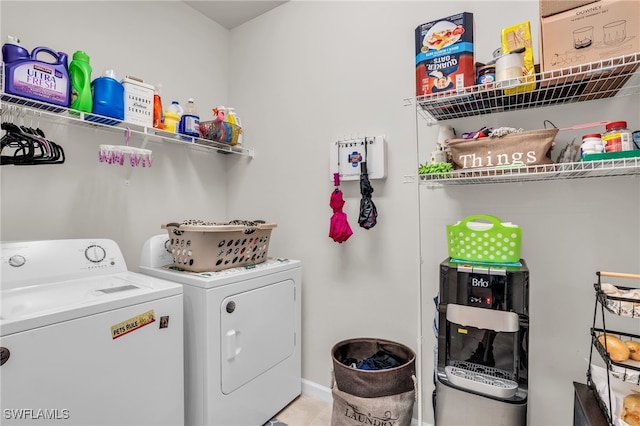 laundry room with separate washer and dryer